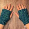 Hands with crochet fingerless gloves