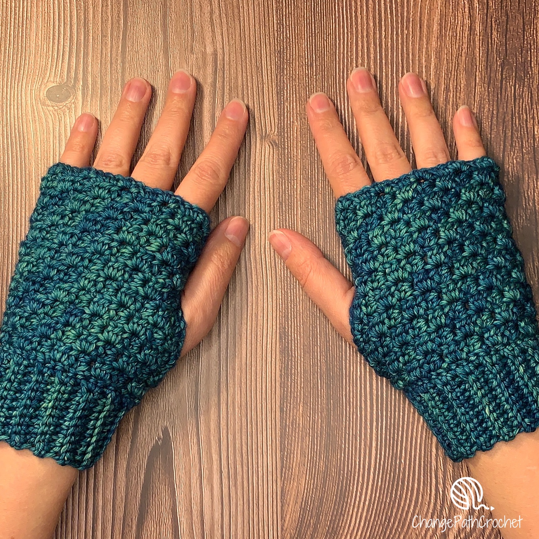 Hands with crochet fingerless gloves