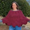 woman wearing zigzag poncho with open arms