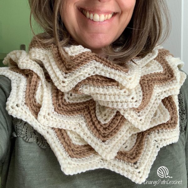 woman wearing a zigzag scarf