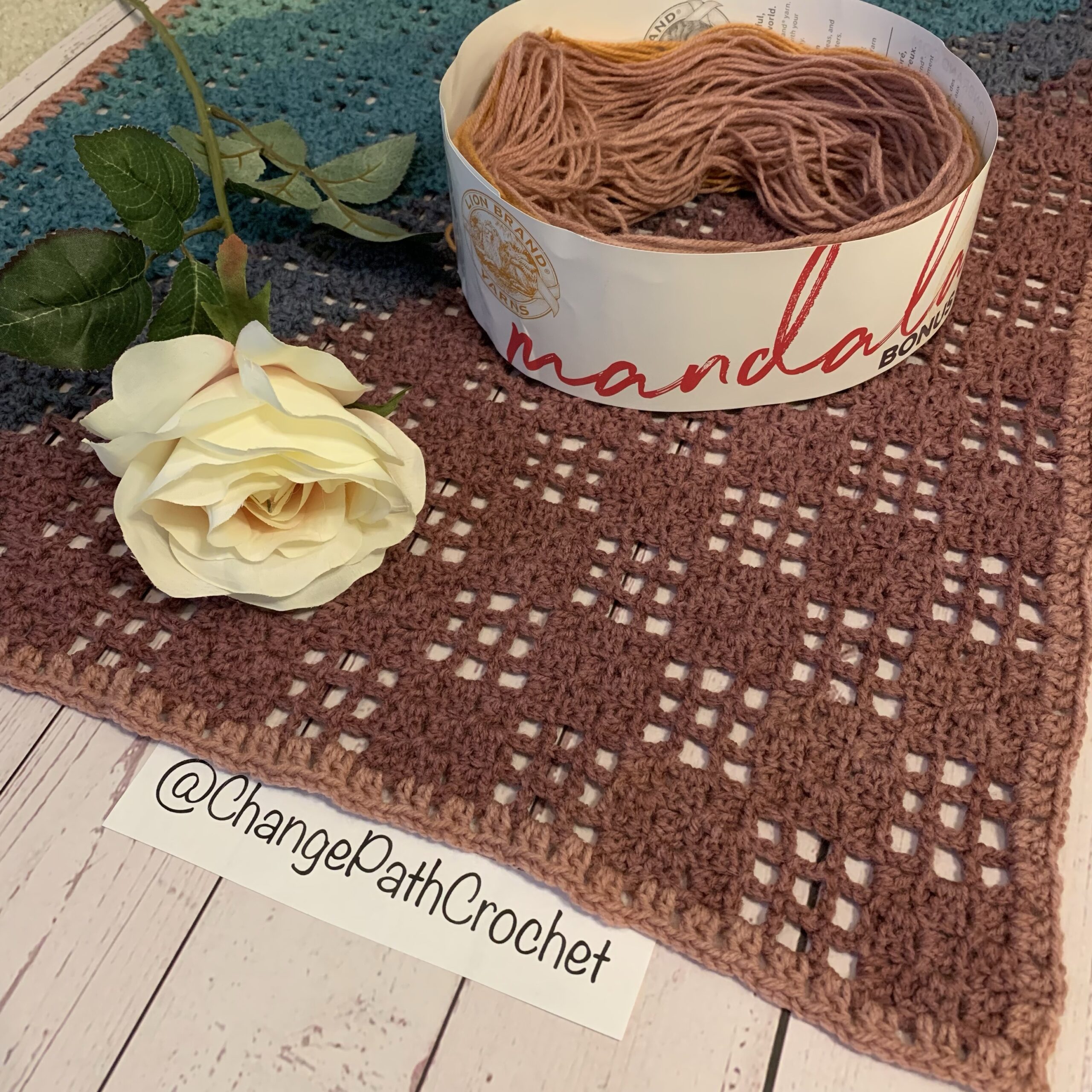 Shawl with rose and yarn