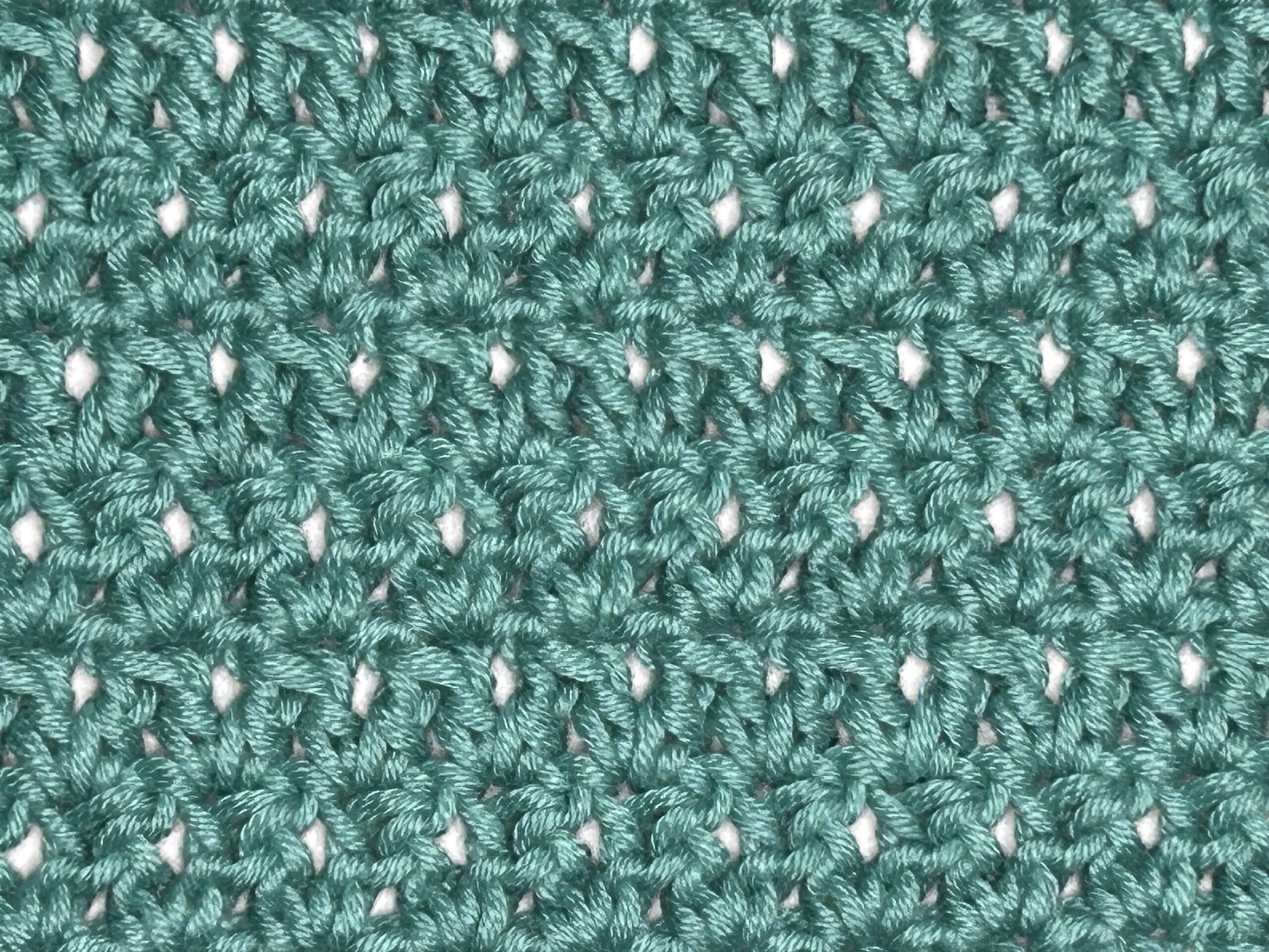 Rows of green cane stitches